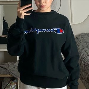 Champion black crewneck. Huge logo.